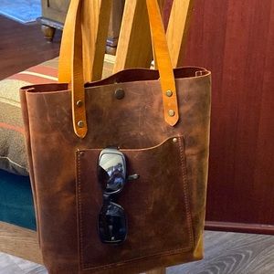 Pure genuine Italian Leather wore about a week it’s beautiful!